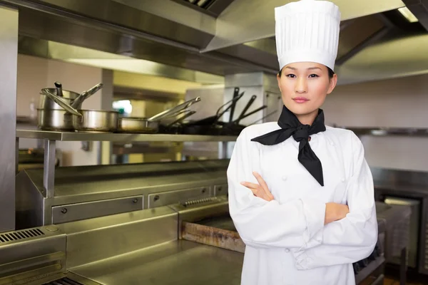 Confident cook in kitchen — Stock Photo, Image