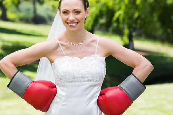 Bride wearing boxing gloves — Stock Photo, Image