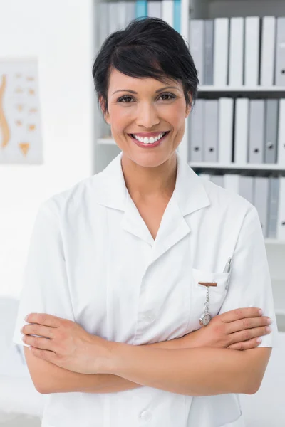 Portrait of a smiling confident female doctor — Stock Photo, Image