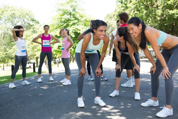 Marathon runners taking a break — Stock Photo, Image