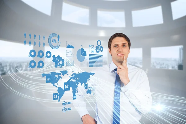 Confused businessman with global interface — Stock Photo, Image