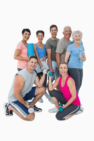 Full length portrait of happy fitness class — Stock Photo, Image