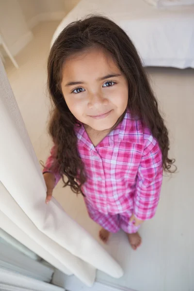 Smiling girl in bedroom — Stock Photo, Image