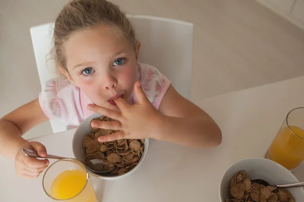 Girl having breakfast — Stock Photo, Image