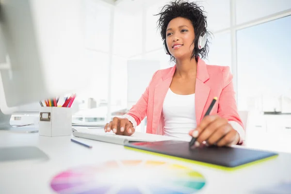 Casual female photo editor using graphics tablet — Stock Photo, Image