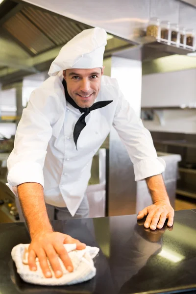Cook wiping the counter top — Stock Photo, Image