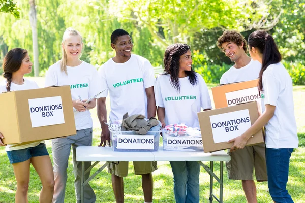 Group of volunteers in park — Stock Photo, Image