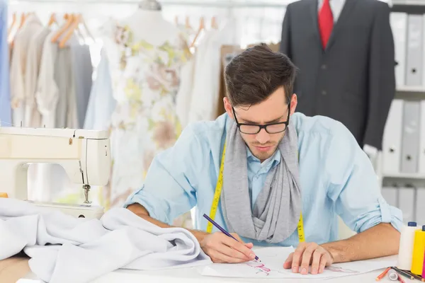 Fashion designer working on his designs — Stock Photo, Image