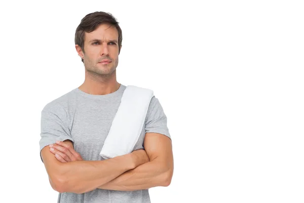 Portrait of a fit young man with towel — Stock Photo, Image