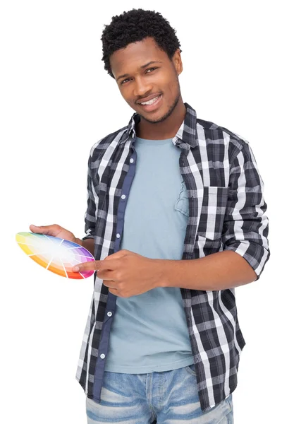 Retrato de un joven con muestras de pintura —  Fotos de Stock