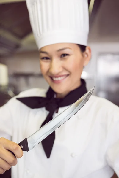 Cook holding knife — Stock Photo, Image