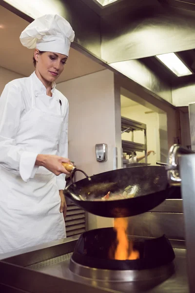 Chef preparing food in kitchen — Stock Photo, Image