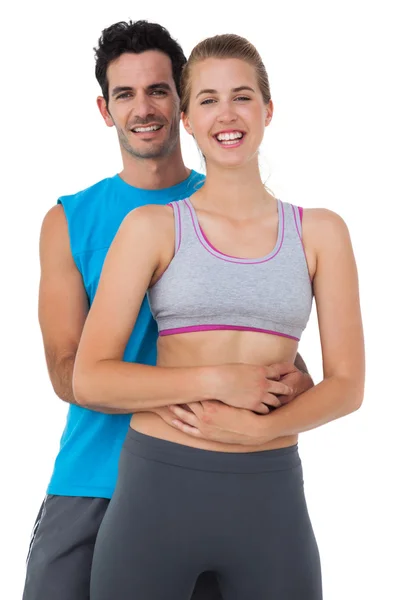 Porträtt av en glad sportiga unga par — Stockfoto