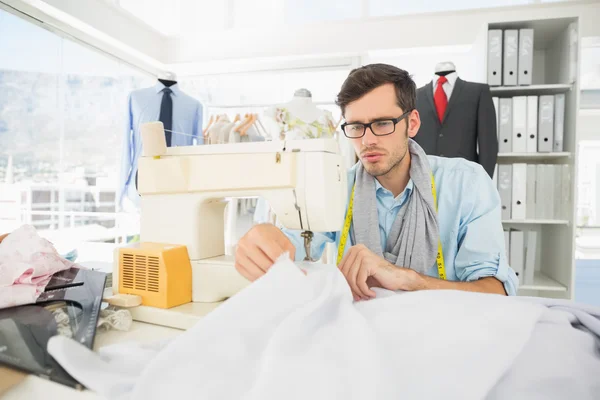 Male tailor sewing in workshop — Stock Photo, Image