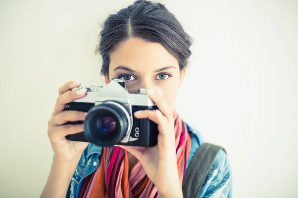 Attractive brunette taking a photo — Stock Photo, Image