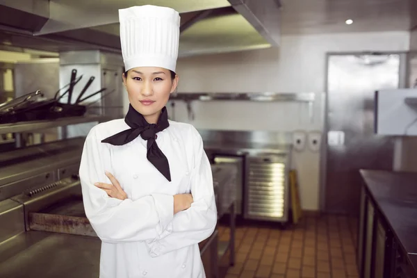 Confident cook in kitchen — Stock Photo, Image