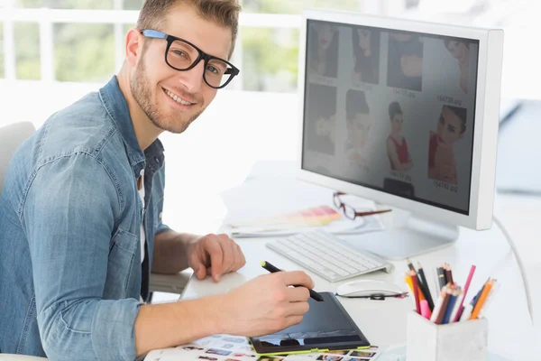 Handsome editor working with digitizer — Stock Photo, Image