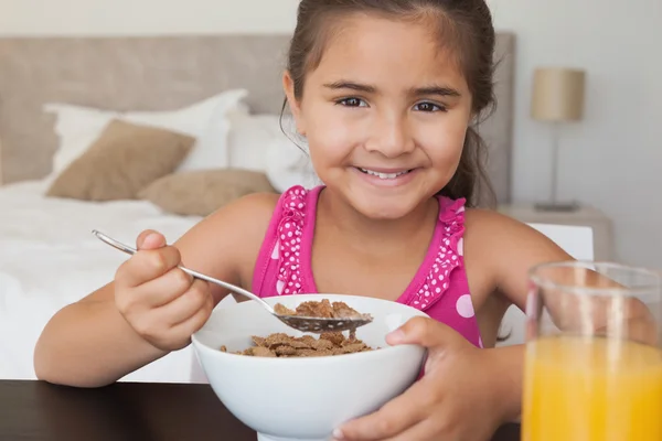 Girl having breakfast — Stock Photo, Image