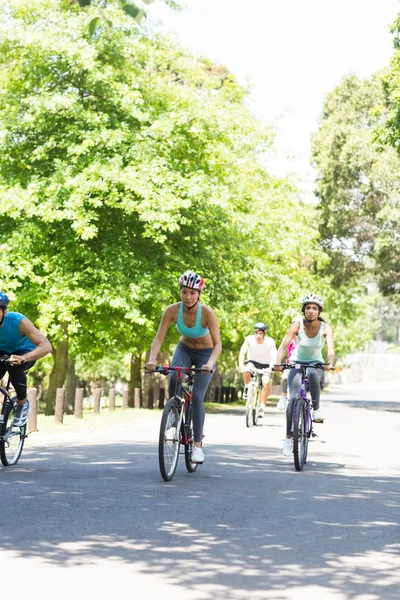 Group of cyclists riding bikes — Stock Photo, Image