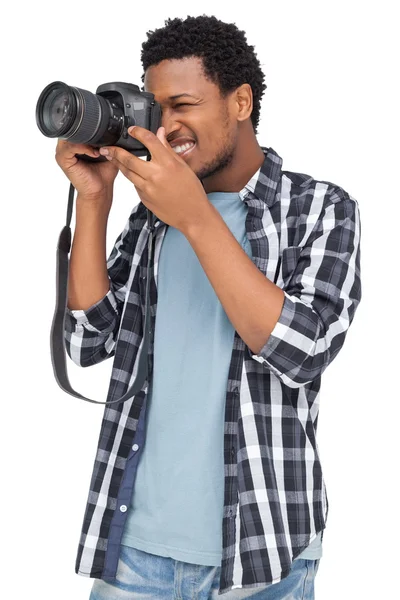Młody człowiek z aparatem fotograficznym — Zdjęcie stockowe