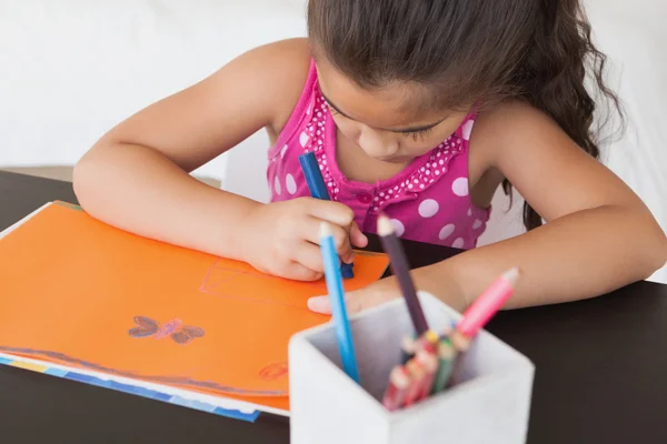 Menina desenho em papel laranja — Fotografia de Stock