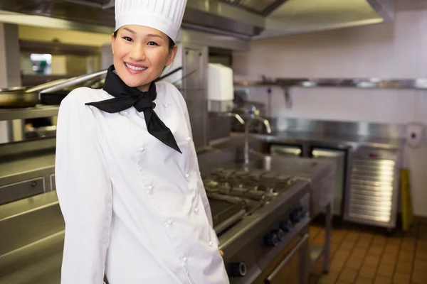 Cook standing in kitchen — Stock Photo, Image