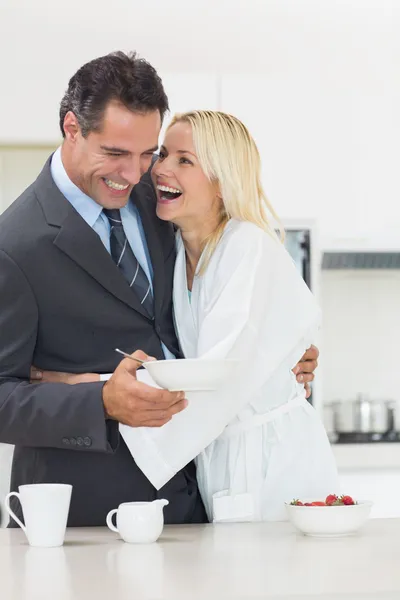 Woman embracing well dressed man — Stock Photo, Image