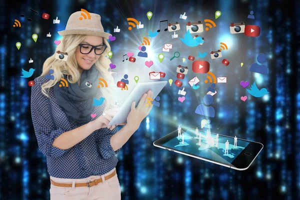 Stylish blonde using tablet pc with app icons and smartphone — Stock Photo, Image