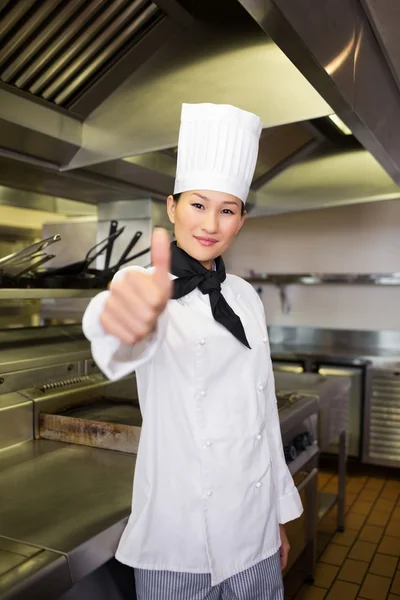 Gebaren thumbs up-kok — Stockfoto