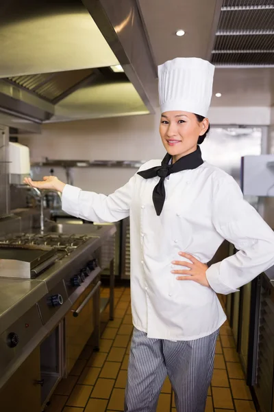 Confident cook in kitchen — Stock Photo, Image