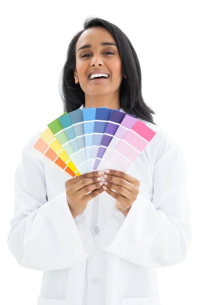 Portrait of a woman with paint samples — Stock Photo, Image