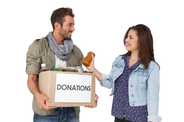 Casal com caixa de doação — Fotografia de Stock