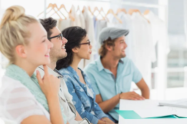 Fashion designers discussing designs — Stock Photo, Image