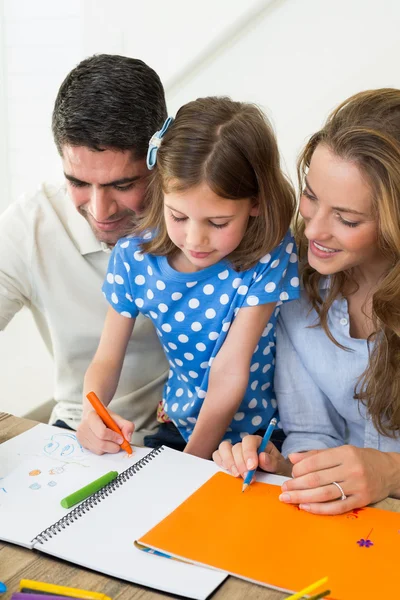 Ouders en dochter kleuren Stockfoto