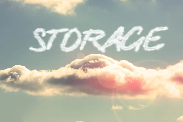 Storage - against bright blue sky with cloud — Stock Photo, Image