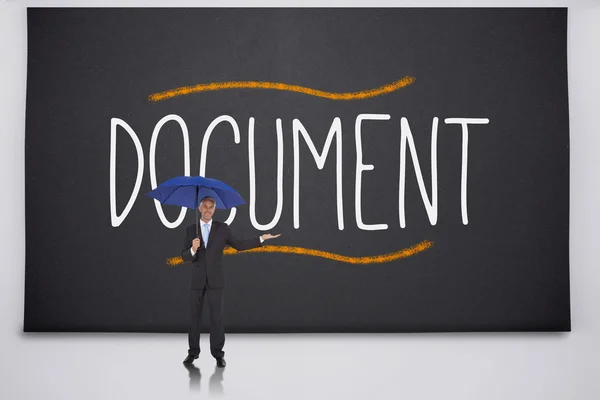 Businessman holding umbrella against the word document — Stock Photo, Image