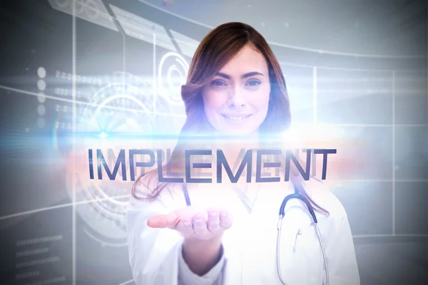 Word implement and portrait of female nurse — Stock Photo, Image