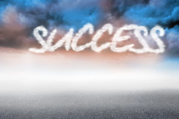 Word success against cloudy landscape background — Stock Photo, Image