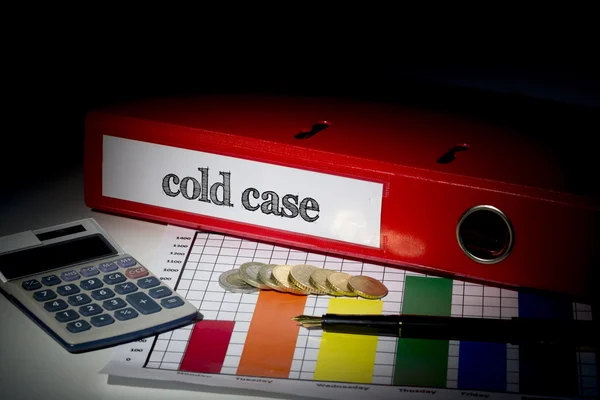 Cold case on red business binder — Stock Photo, Image