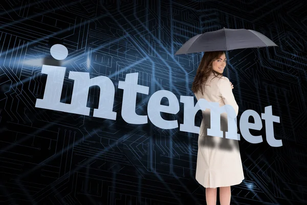 Businesswoman behind the word internet — Stock Photo, Image