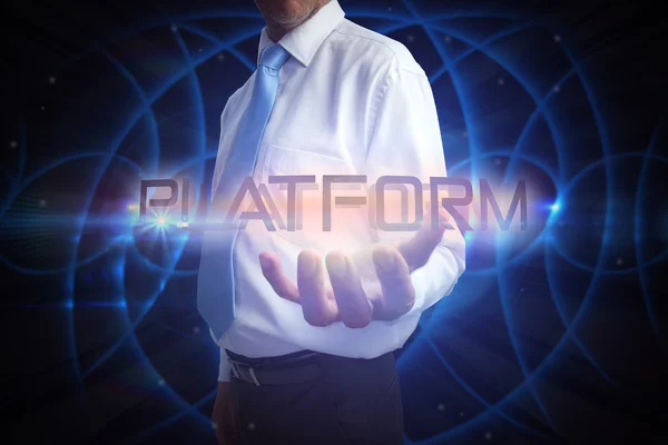 Businessman presenting the word platform — Stock Photo, Image