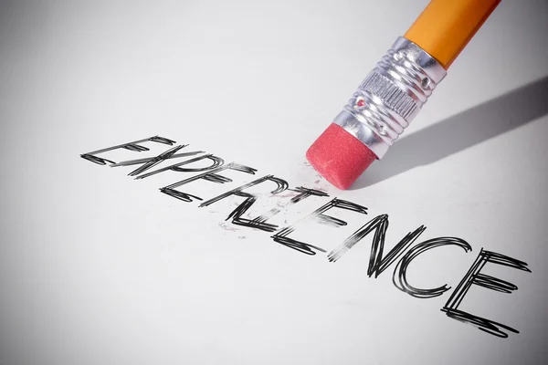 Pencil erasing the word Experience — Stock Photo, Image