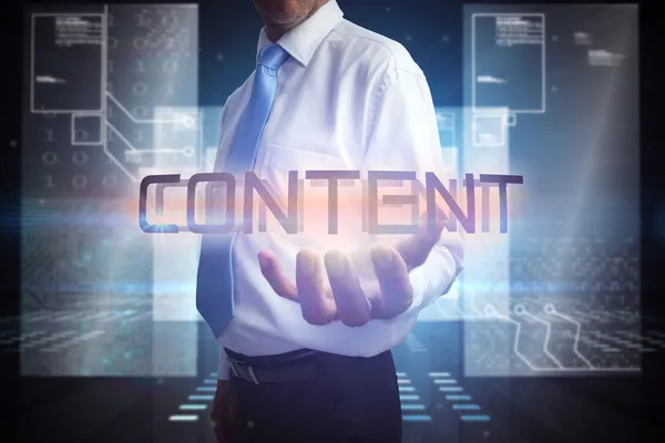 Businessman presenting the word content — Stock Photo, Image