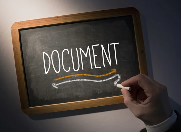 Hand writing Document on chalkboard — Stock Photo, Image