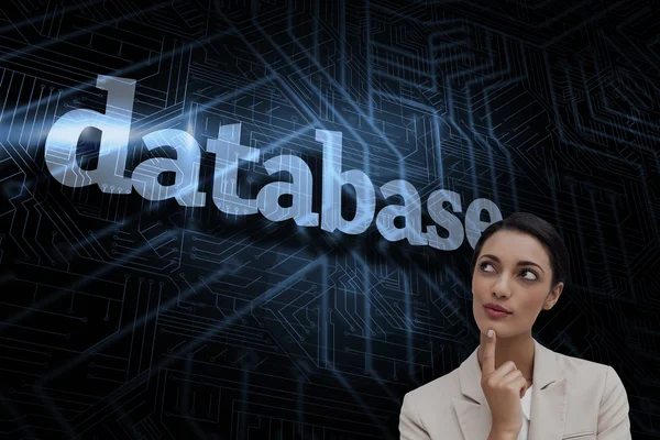 Word database and smiling businesswoman — Stock Photo, Image