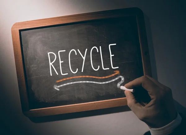 Hand writing Recycle on chalkboard — Stock Photo, Image