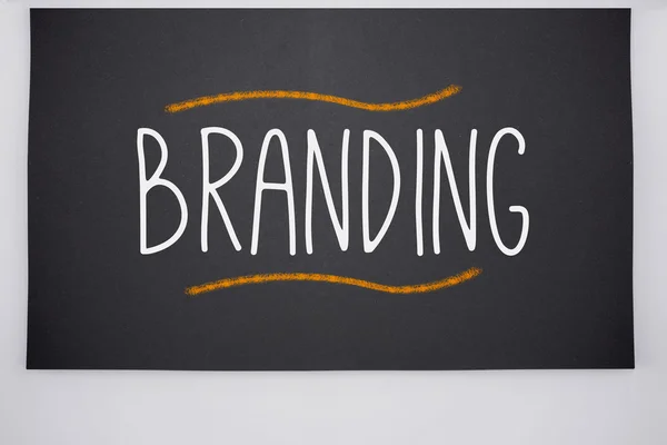 Branding written on big blackboard — Stock Photo, Image