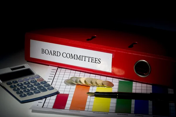Comitês do conselho de administração em pasta vermelha — Fotografia de Stock