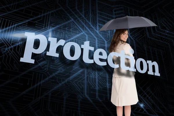 Zakenvrouw achter het woord bescherming — Stockfoto