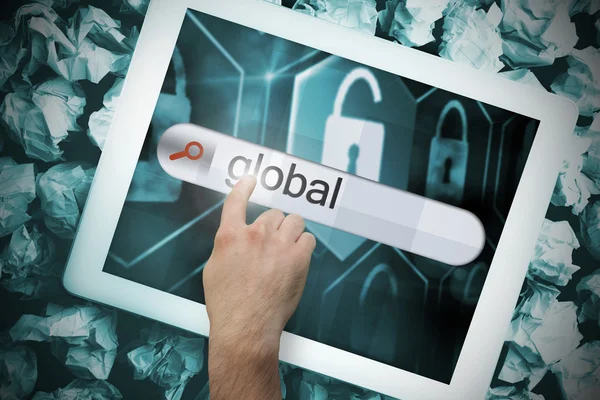 Hand touching global on search bar on tablet screen — Stock Photo, Image